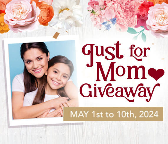 Just for Mom Giveaway - Polaroid Photo of Mother hugging daughter. The photo is on a wooden table with a floral border.
